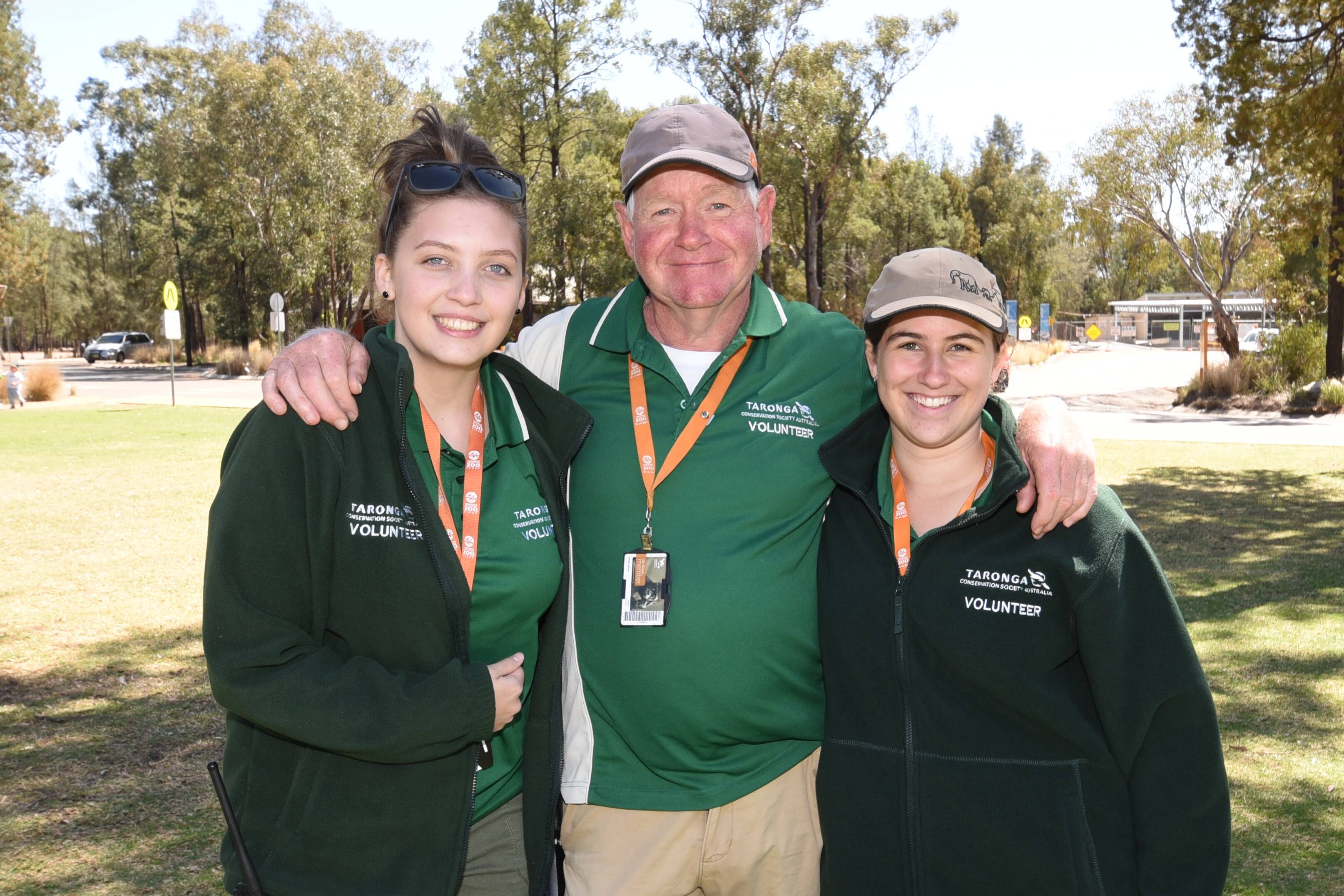 Three Volunteers standing together at Dubbo