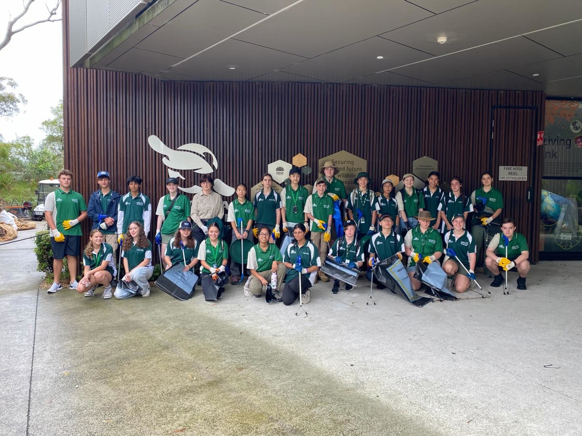 YATZ group of students cleaning up