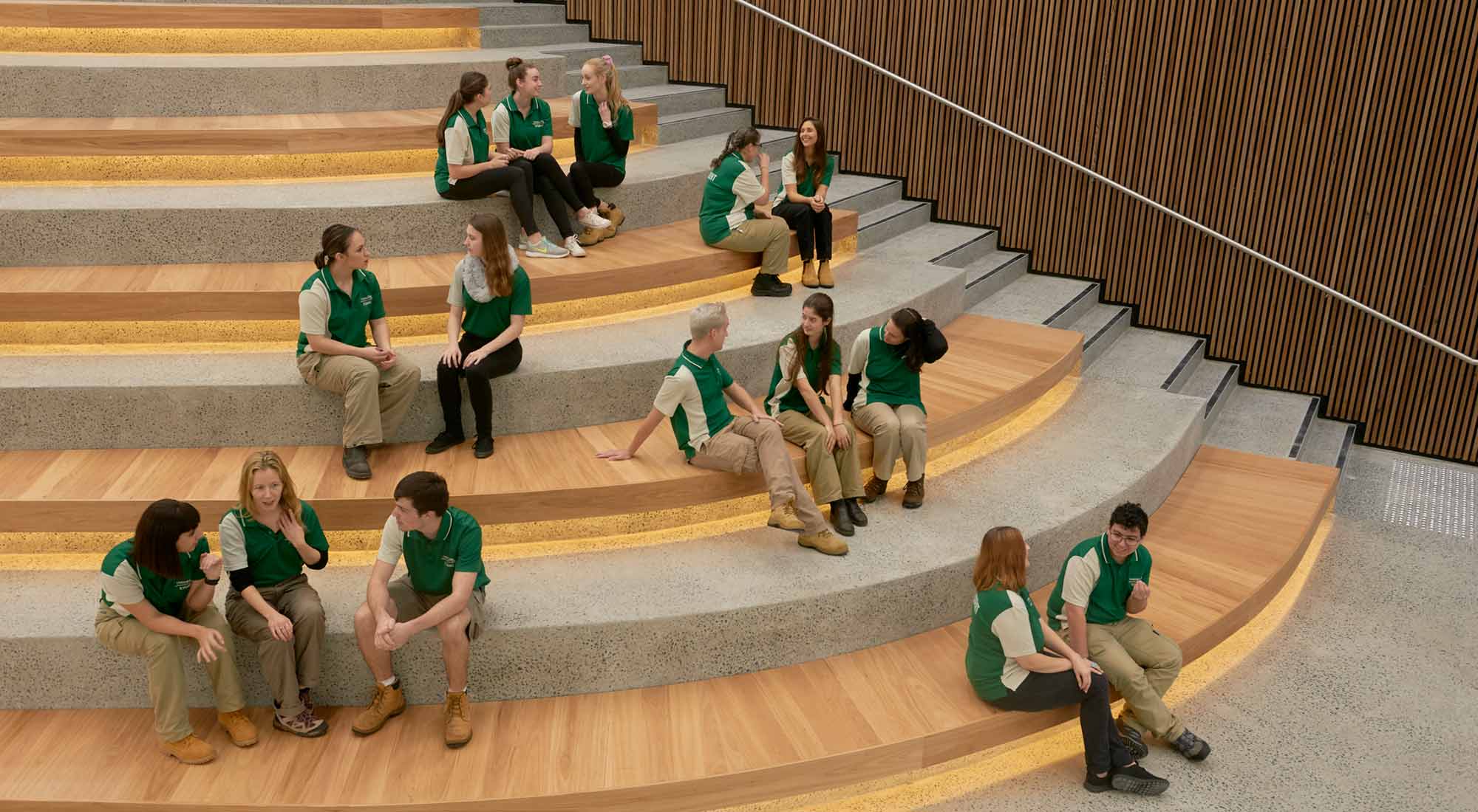 Students sitting in the main atrium of the Taronga Institute