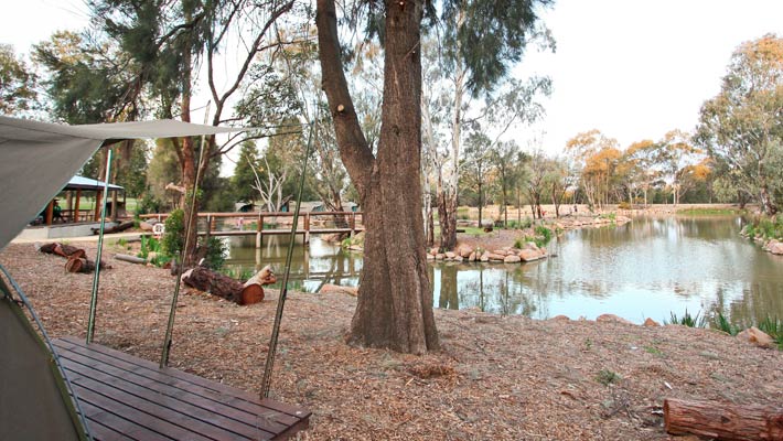 The campsite is arranged around a central Billabong
