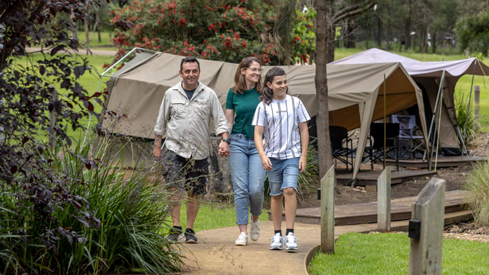 Family enjoying a stroll around Billabong Camp